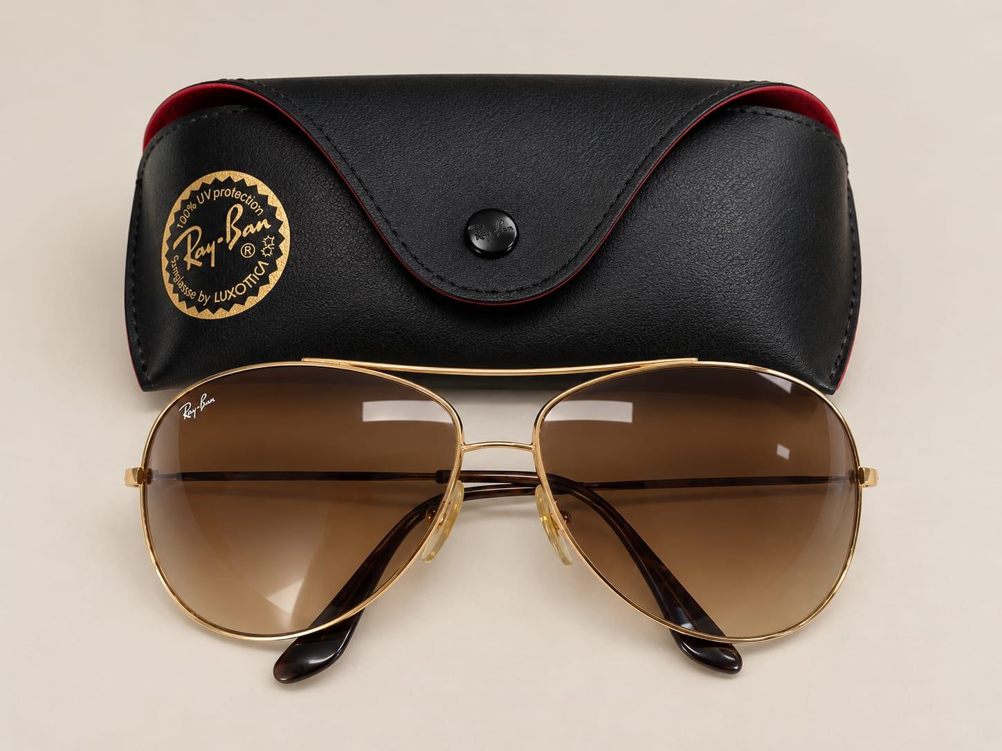 occhiali da sole dorati Rayban