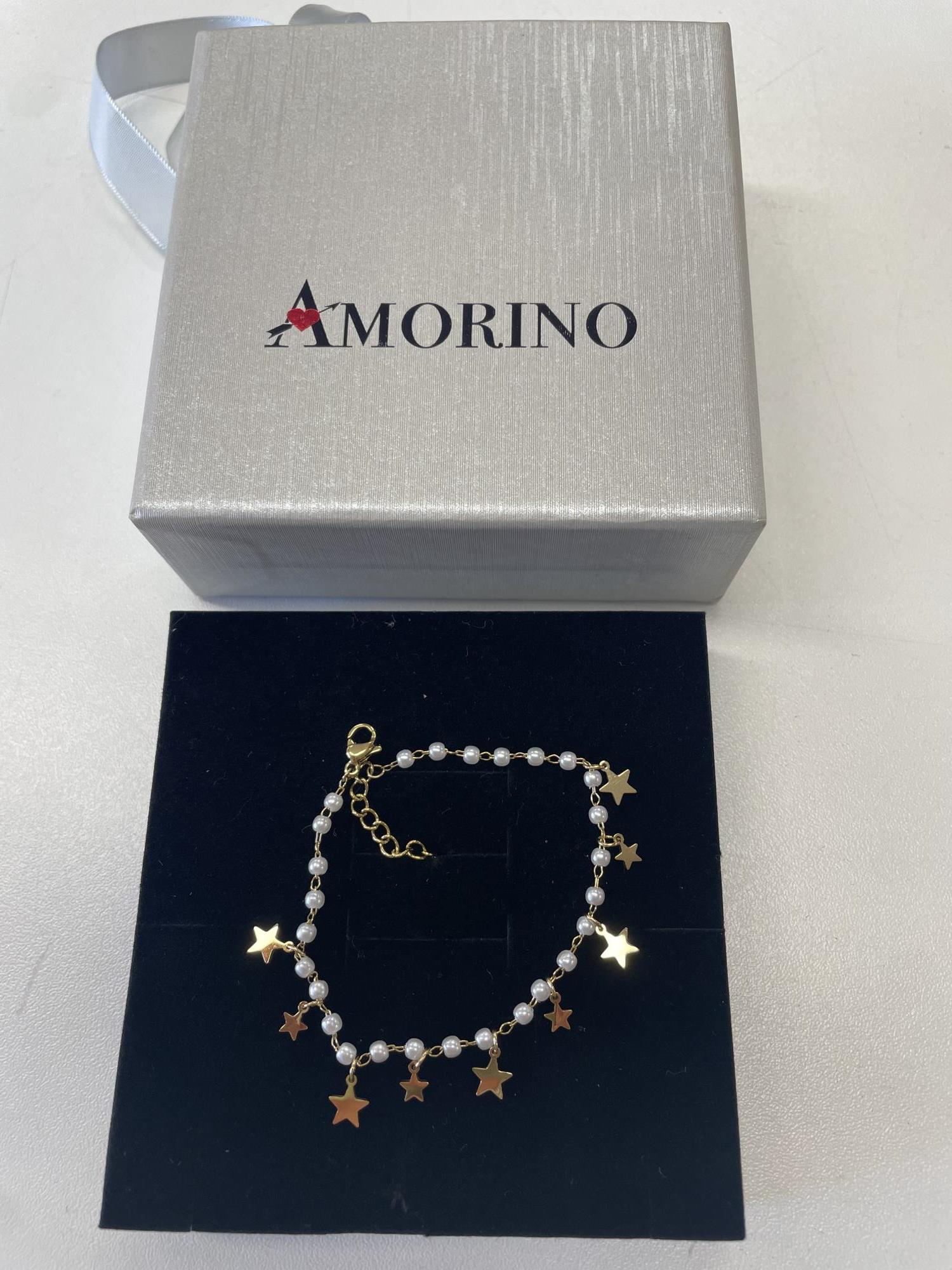 braccialetto perline bianche con stelline dorate Amorino